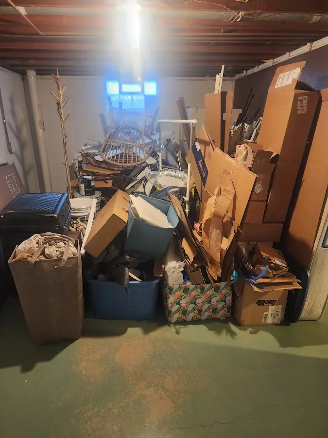 Roll-off dumpster container at job site for 2 Yard Dumpster Rental in Senoia